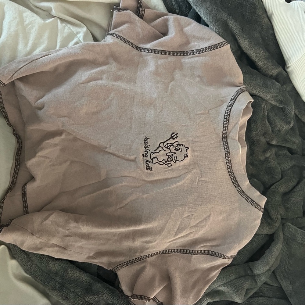 Garage stitched baby tee